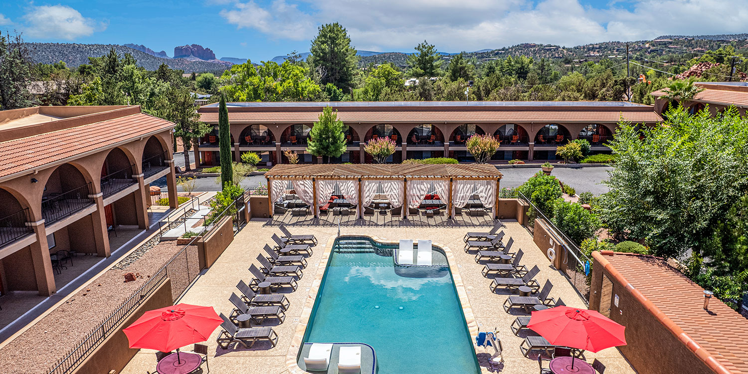 Soak Up the Rays and Take a Dip in Our Outdoor Pool Make  Unforgettable Memories With Sunset Views Over the Red Rocks